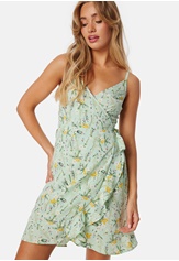 flounce-short-strap-dress-green-patterned